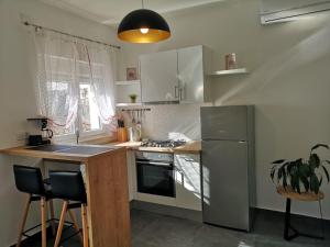Kuchyň nebo kuchyňský kout v ubytování Apartment Klara