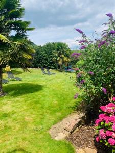 Ein Garten an der Unterkunft Gästehaus Helbighof