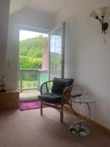 Ein Sitzbereich in der Unterkunft Gästehaus Helbighof