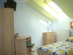 Postel nebo postele na pokoji v ubytování Willa Kaper