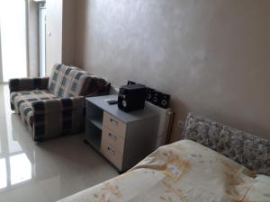 Predel za sedenje v nastanitvi apartman