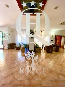Lobi atau kawasan kaunter penerimaan di Hotel Ristorante Le Querciolaie dei Ricci