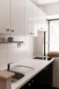 Kuchyň nebo kuchyňský kout v ubytování Apartment Teatar