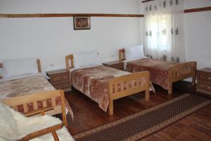 Voodi või voodid majutusasutuse Guest House Sabriu toas