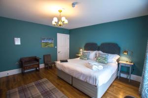 Una cama o camas en una habitación de Bay Tree Broadstairs