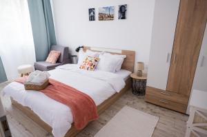 A bed or beds in a room at Tarno Guest House