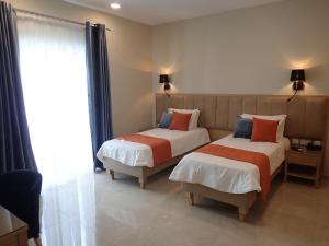 Ένα ή περισσότερα κρεβάτια σε δωμάτιο στο Duncan Guesthouse