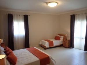 Ένα ή περισσότερα κρεβάτια σε δωμάτιο στο Duncan Guesthouse