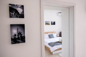 A bed or beds in a room at Tarno Guest House