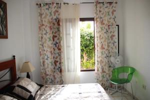 Łóżko lub łóżka w pokoju w obiekcie Balcon del Mar en la Costa