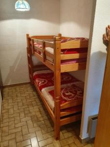 Ένα ή περισσότερα κρεβάτια σε δωμάτιο στο Appartement 6 Personnes les daims 2 chambres