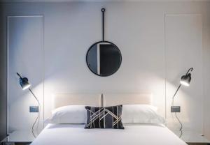 Posteľ alebo postele v izbe v ubytovaní LUXURY SANTO STEFANO + 13 fotografií