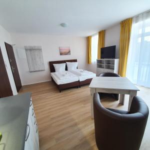 Ένα ή περισσότερα κρεβάτια σε δωμάτιο στο Apartments Oberschlesien