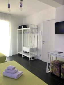 Gallery image of Sunrise Rooms in Grado +24 photos