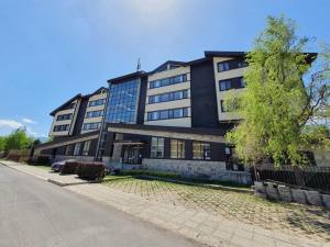 Budova, kde se aparthotel nachází