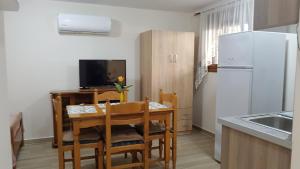 A kitchen or kitchenette at Fyllou Apartment Asprovalta