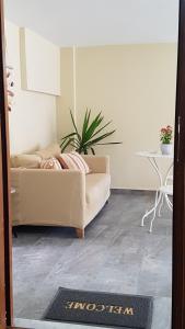 A seating area at Fyllou Apartment Asprovalta