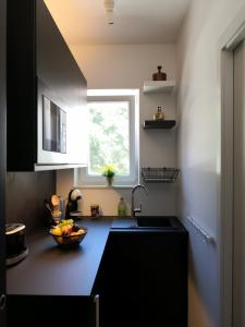 Kuchyňa alebo kuchynka v ubytovaní Scuderia Split Rooms