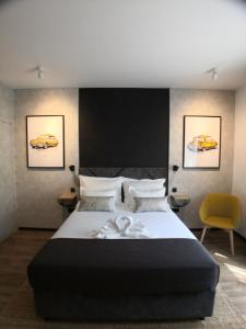 Posteľ alebo postele v izbe v ubytovaní Scuderia Split Rooms