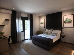 Posteľ alebo postele v izbe v ubytovaní Scuderia Split Rooms