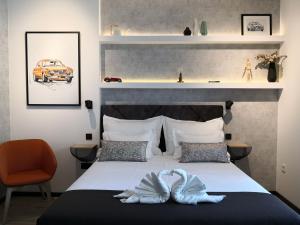 Posteľ alebo postele v izbe v ubytovaní Scuderia Split Rooms