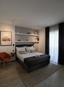 Posteľ alebo postele v izbe v ubytovaní Scuderia Split Rooms