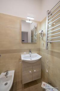 A bathroom at HOLYGOLD Suite ****