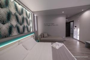 A bed or beds in a room at HOLYGOLD Suite ****