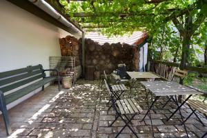 A patio or other outdoor area at Troszt Pince Apartman