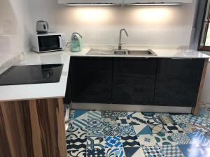 Kuchyň nebo kuchyňský kout v ubytování La Capilla del Corral