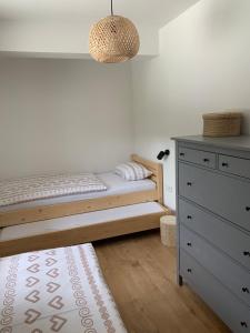 Postel nebo postele na pokoji v ubytování YASNA Apartments