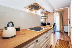 Kuchyň nebo kuchyňský kout v ubytování Apartment Miral