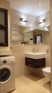 Kúpeľňa v ubytovaní LaRoom Apartament