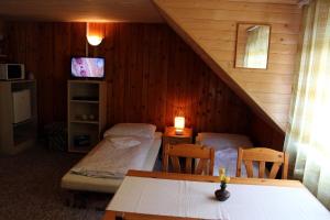 Cama ou camas em um quarto em Chata Horec