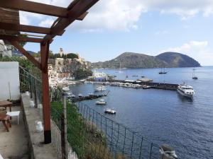 a view of a harbor with boats in the water at Terrazza sul Mare in Lipari