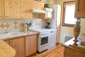 Kuchyň nebo kuchyňský kout v ubytování Superbe appartement Font Romeu La Pardallera