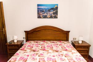 Ein Bett oder Betten in einem Zimmer der Unterkunft Sulle orme di Francesco appartamento verde