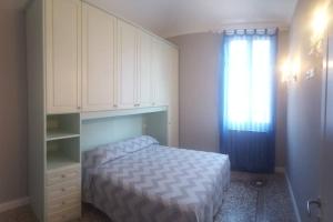 Posteľ alebo postele v izbe v ubytovaní Prestige House a pochi passi dal mare