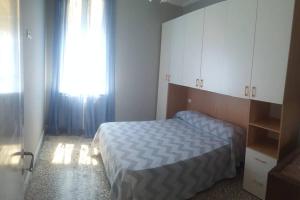 Posteľ alebo postele v izbe v ubytovaní Prestige House a pochi passi dal mare