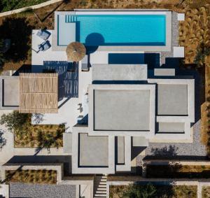 an aerial view of a house with a swimming pool at Mimi and Coco Villas Corfu in Paramonas