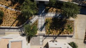 an overhead view of a building with trees at Mimi and Coco Villas Corfu in Paramonas