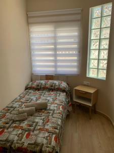 Кровать или кровати в номере Casa PMD