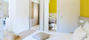 Ein Bett oder Betten in einem Zimmer der Unterkunft DIEHOLIDAYBUCHT