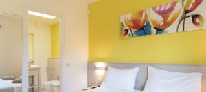 Ein Bett oder Betten in einem Zimmer der Unterkunft DIEHOLIDAYBUCHT