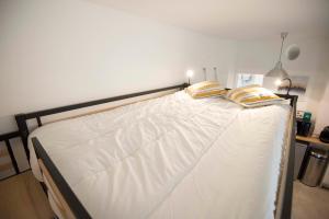 Posteľ alebo postele v izbe v ubytovaní Functional apartment near Montmartre