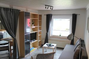 Χώρος καθιστικού στο Ferienwohnung Roggenbach - Studio mit Gartenblick