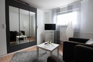 TV a/nebo společenská místnost v ubytování Maxbed + 10 fotografií