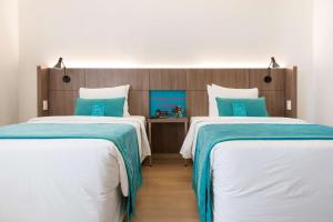 Letto o letti in una camera di Libre Hotel, BW Signature Collection by Best Western