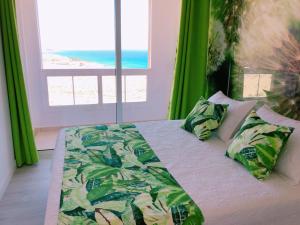 Llit o llits en una habitació de Apart. Playa La Barca