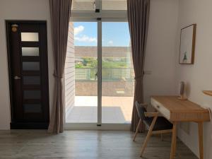 Balkón nebo terasa v ubytování Lanshan Guest House